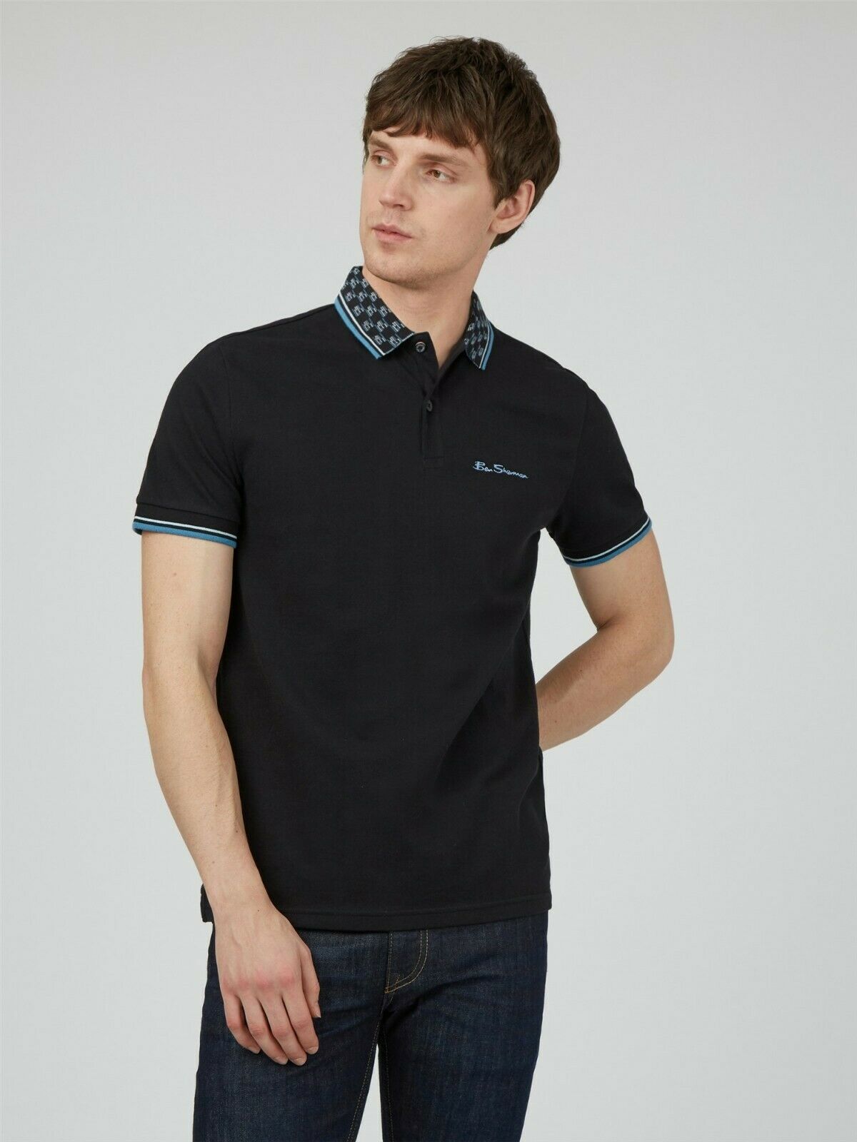 polo shirt with surfboard logo